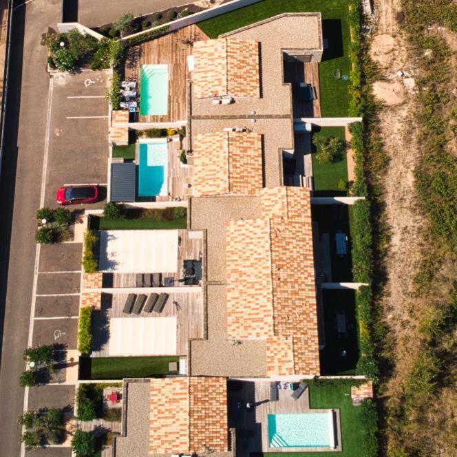 לצ'י Villa Home Holiday A Cala Rossa מראה חיצוני תמונה